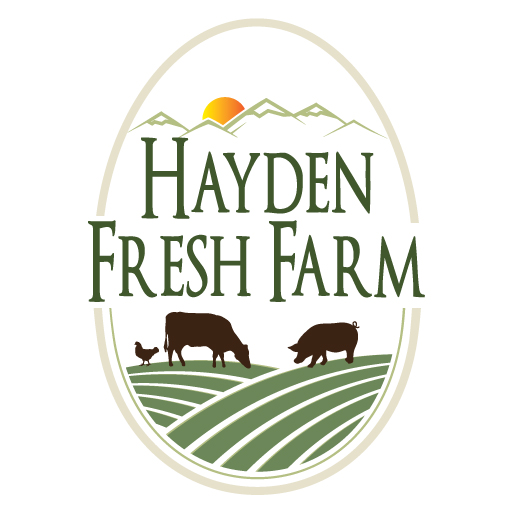 A logo of hayden fresh farm with cows and a cat.